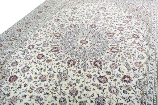 Backside of handmade New Kashan rug showing knot structure and weave density