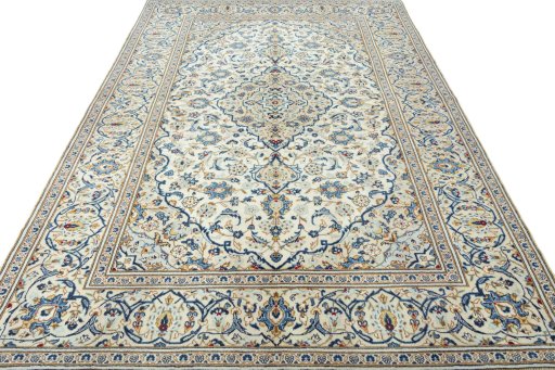 Surface texture of 2000s Kashan rug with natural Wool and intricate pattern