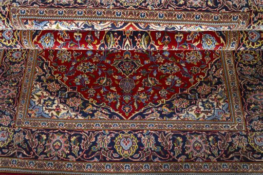 Close-up detail of 2000s Kashan rug from Iran / Persia showing Cork weave