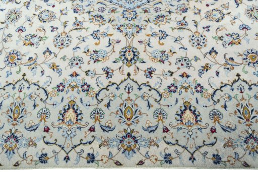 Corner detail of New Kashan rug showing border pattern and Wool pile