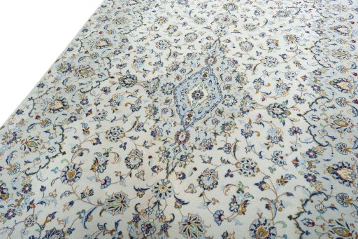 Backside of handmade New Kashan rug showing knot structure and weave density