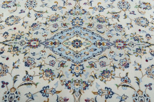 Central medallion detail of New Kashan rug from Iran / Persia