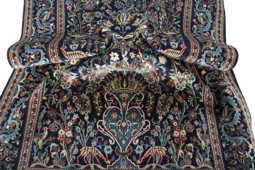 Surface texture of 2000s Kashan rug with natural Wool and intricate pattern