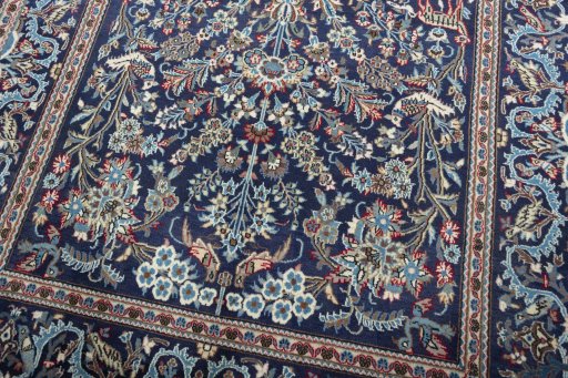 Close-up detail of 2000s Kashan rug from Iran / Persia showing Wool weave