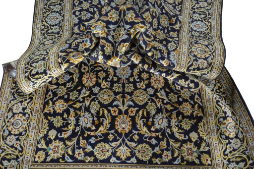 Surface texture of 1970s Kashan rug with natural Wool and intricate pattern