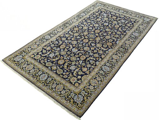 Corner detail of 1970s Kashan rug showing border pattern and Wool pile