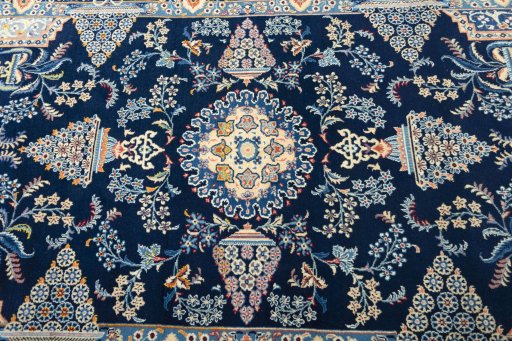 Central medallion detail of 2000s Kashan rug from Iran / Persia