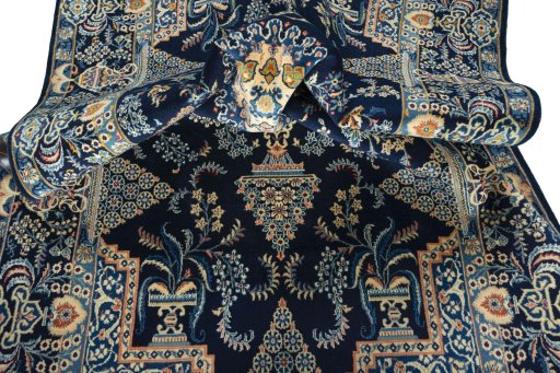 Close-up detail of 2000s Kashan rug from Iran / Persia showing Wool weave