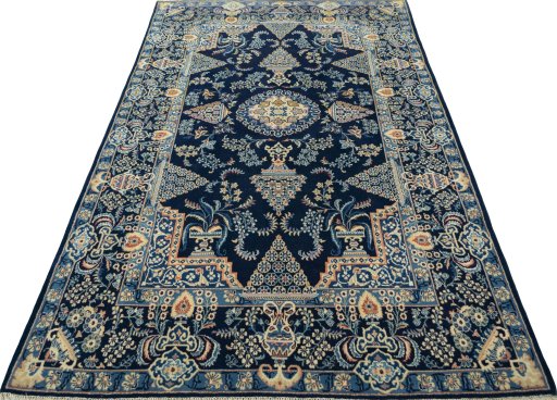 Surface texture of 2000s Kashan rug with natural Wool and intricate pattern