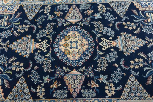 Central medallion detail of 2000s Kashan rug from Iran / Persia