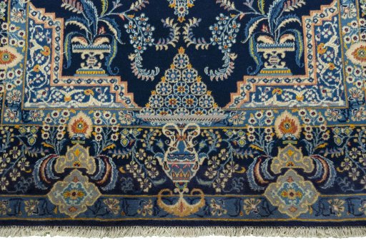 Close-up detail of 2000s Kashan rug from Iran / Persia showing Wool weave