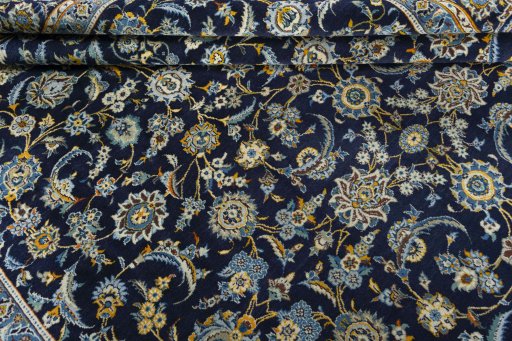 Close-up detail of 1970s Kashan rug from Iran / Persia showing Wool weave