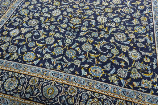 Close-up detail of 1970s Kashan rug from Iran / Persia showing Wool weave