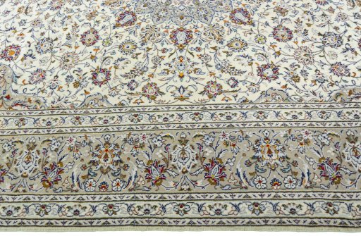 Corner detail of New Kashan rug showing border pattern and Wool pile