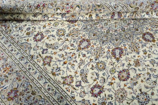 Close-up detail of New Kashan rug from Iran / Persia showing Wool weave