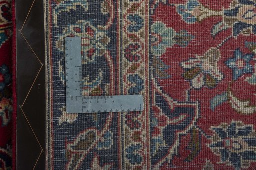 Surface texture of 2000s Kashan rug with natural Wool and intricate pattern