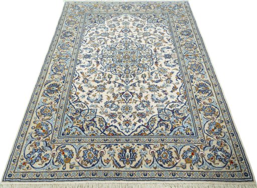 Surface texture of 2000s Kashan rug with natural Wool and intricate pattern