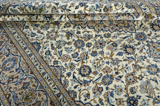 Close-up detail of 2000s Kashan rug from Iran / Persia showing Wool weave