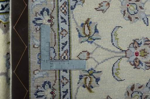 Close-up detail of 2000s Kashan rug from Iran / Persia showing Wool weave