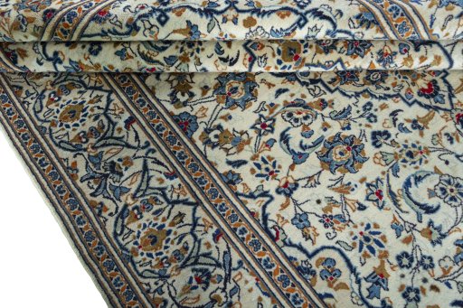 Close-up detail of 2000s Kashan rug from Iran / Persia showing Wool weave