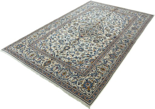 Corner detail of 2000s Kashan rug showing border pattern and Wool pile