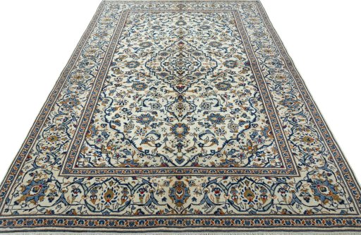 Surface texture of 2000s Kashan rug with natural Wool and intricate pattern