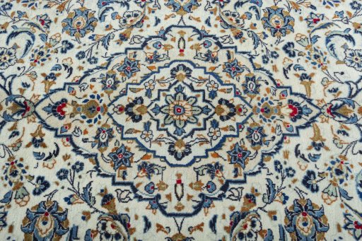 Central medallion detail of 2000s Kashan rug from Iran / Persia