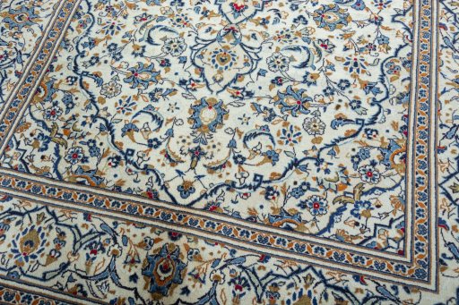 Close-up detail of 2000s Kashan rug from Iran / Persia showing Wool weave