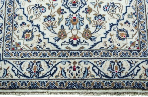 Close-up detail of New Kashan rug from Iran / Persia showing Wool weave