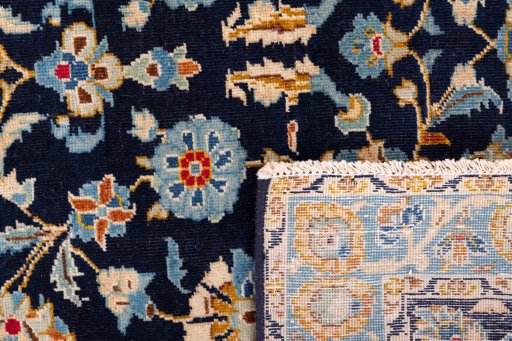 Full view of 1980s Kashan rug from Iran / Persia, 313 × 217 cm in Dark blue tones