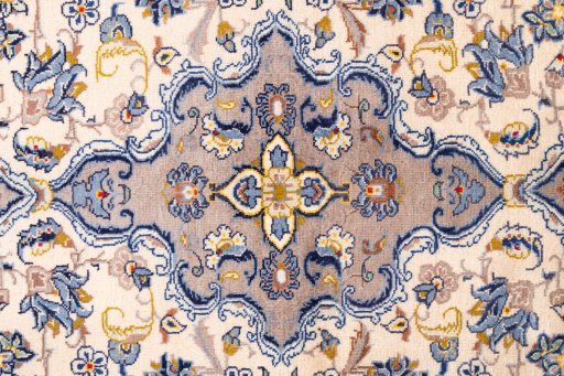 Corner detail of 1980s Kashan rug showing border pattern and Wool pile