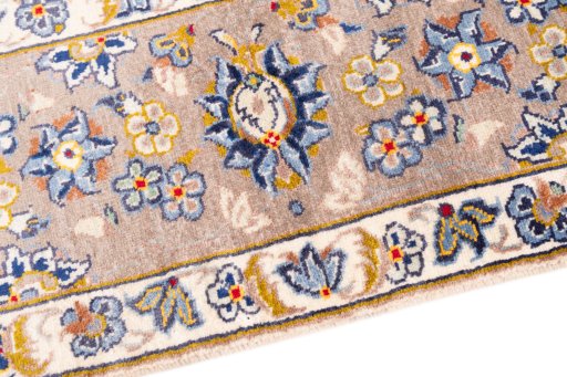 Backside of handmade 1980s Kashan rug showing knot structure and weave density