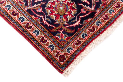 Close-up detail of 1975s Kashan rug from Iran / Persia showing Wool weave