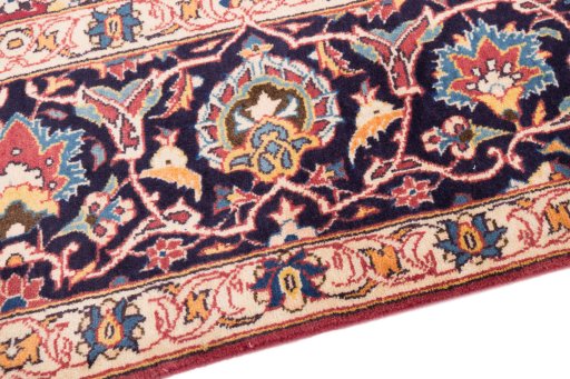Backside of handmade 1974s Kashan rug showing knot structure and weave density