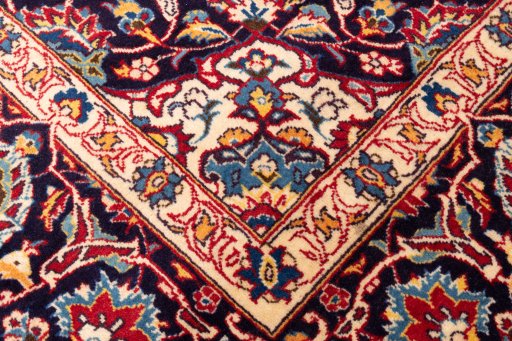 Close-up detail of 1974s Kashan rug from Iran / Persia showing Wool weave