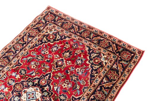 Surface texture of 1999s Kashan rug with natural Wool and intricate pattern