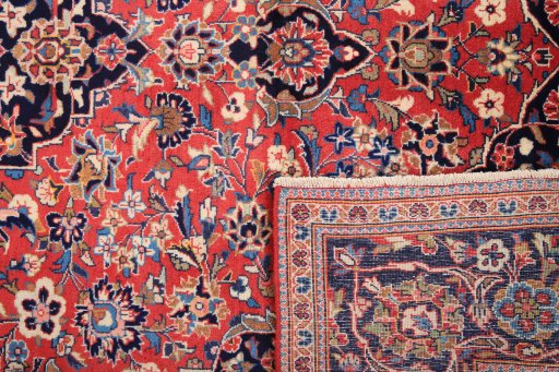 Full view of 1980s Kashan rug from Iran / Persia, 285 × 195 cm in Red tones