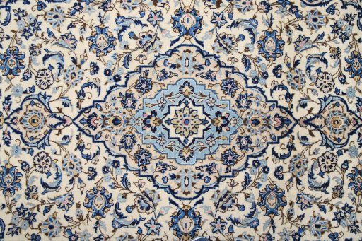 Corner detail of 1990s Kashan rug showing border pattern and Wool pile