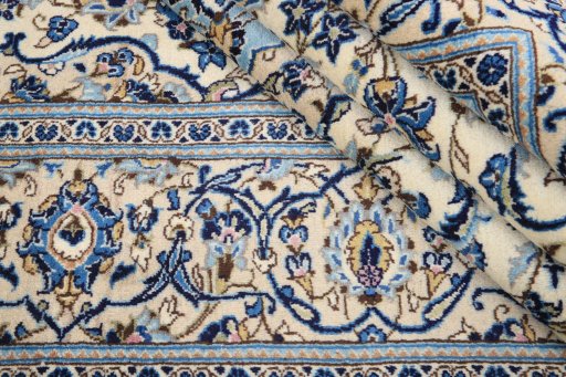 Close-up detail of 1990s Kashan rug from Iran / Persia showing Wool weave