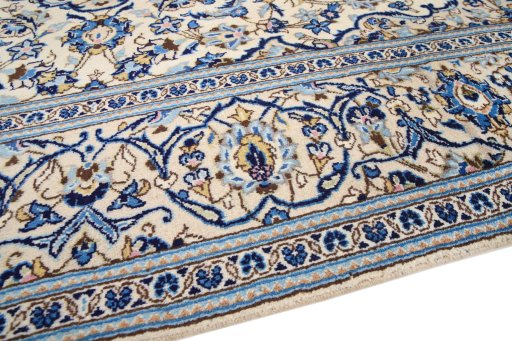 Backside of handmade 1990s Kashan rug showing knot structure and weave density