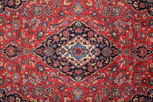 Corner detail of 1990s Kashan rug showing border pattern and Wool pile