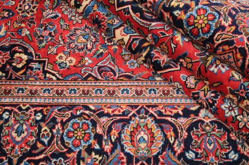 Close-up detail of 1990s Kashan rug from Iran / Persia showing Wool weave