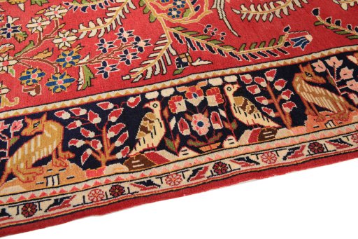Backside of handmade 1970s Kashan rug showing knot structure and weave density