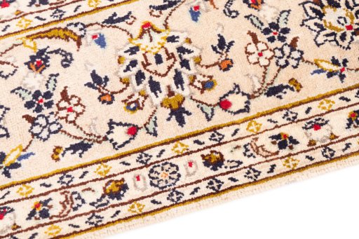 Backside of handmade 1988s Kashan rug showing knot structure and weave density