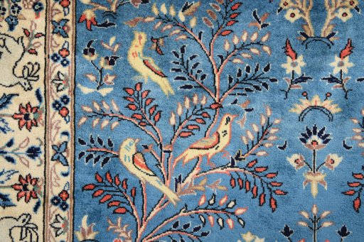 Corner detail of 1950s Kashan rug showing border pattern and Wool pile