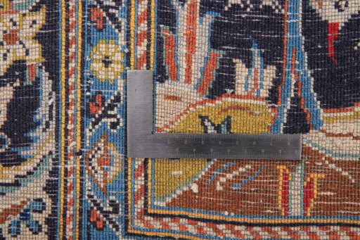 Close-up detail of 1970s Kashan rug from Iran / Persia showing Wool weave