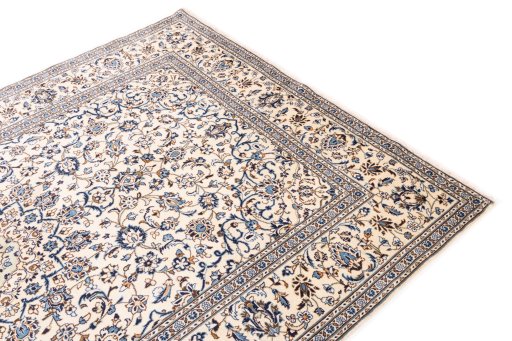Backside of handmade 2000s Kashan rug showing knot structure and weave density