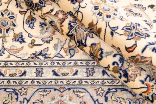 Close-up detail of 1985s Kashan rug from Iran / Persia showing Wool weave