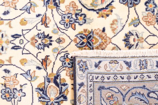Full view of 1985s Kashan rug from Iran / Persia, 290 × 192 cm in Beige tones