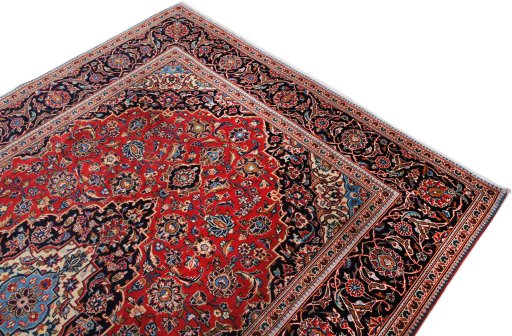 Surface texture of 2000s Kashan rug with natural Wool and intricate pattern